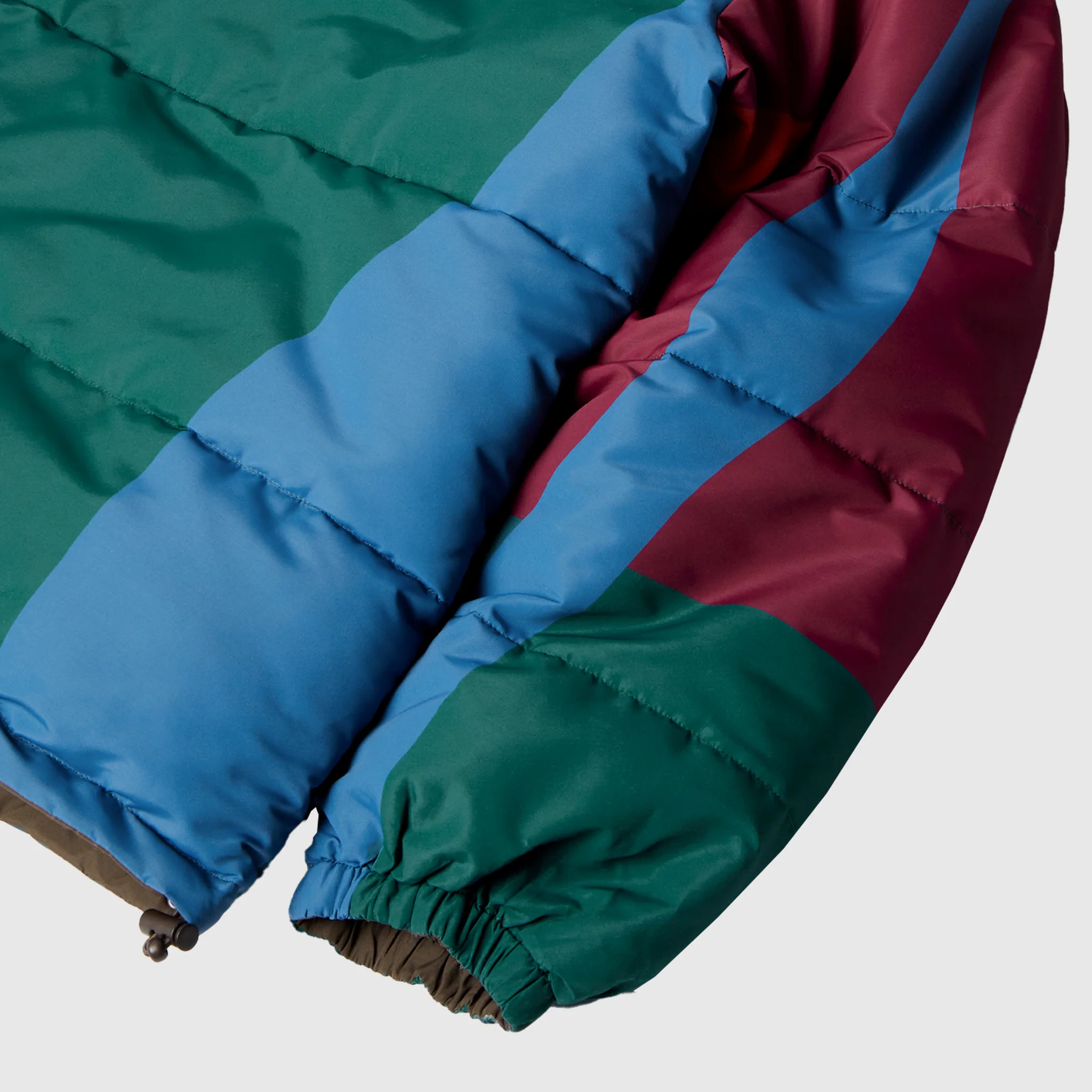 PROTECT THE SUN REVERSIBLE PUFFER JACKET - Image 7